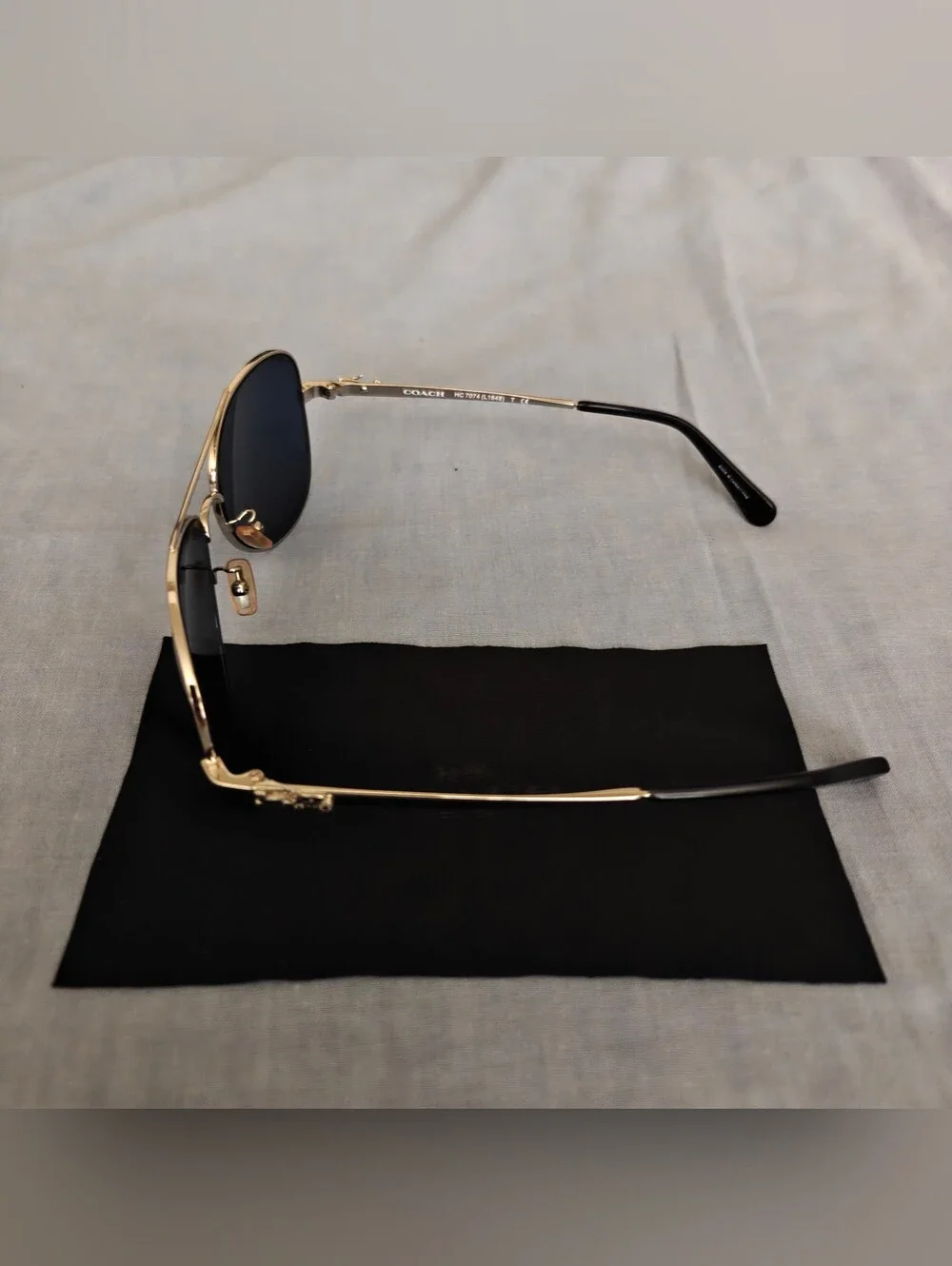 Coach Sunglasses with Silver Frame and Blue Lenses